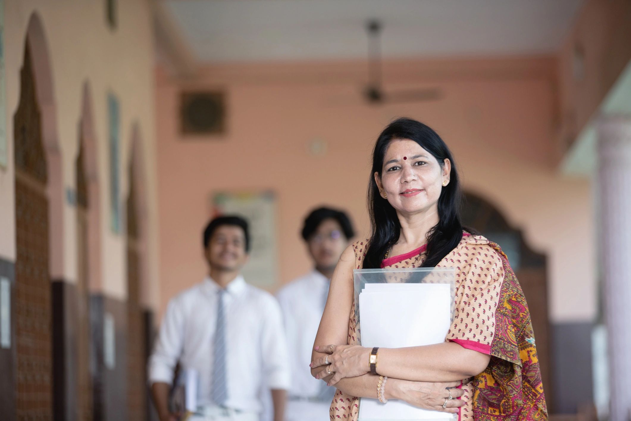 Teacher with students in a classroom