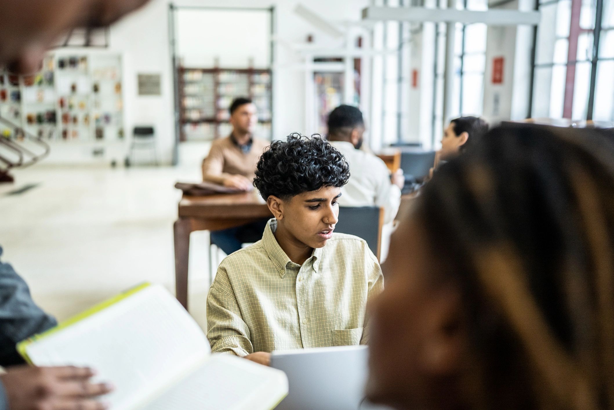 Students studying together in a library