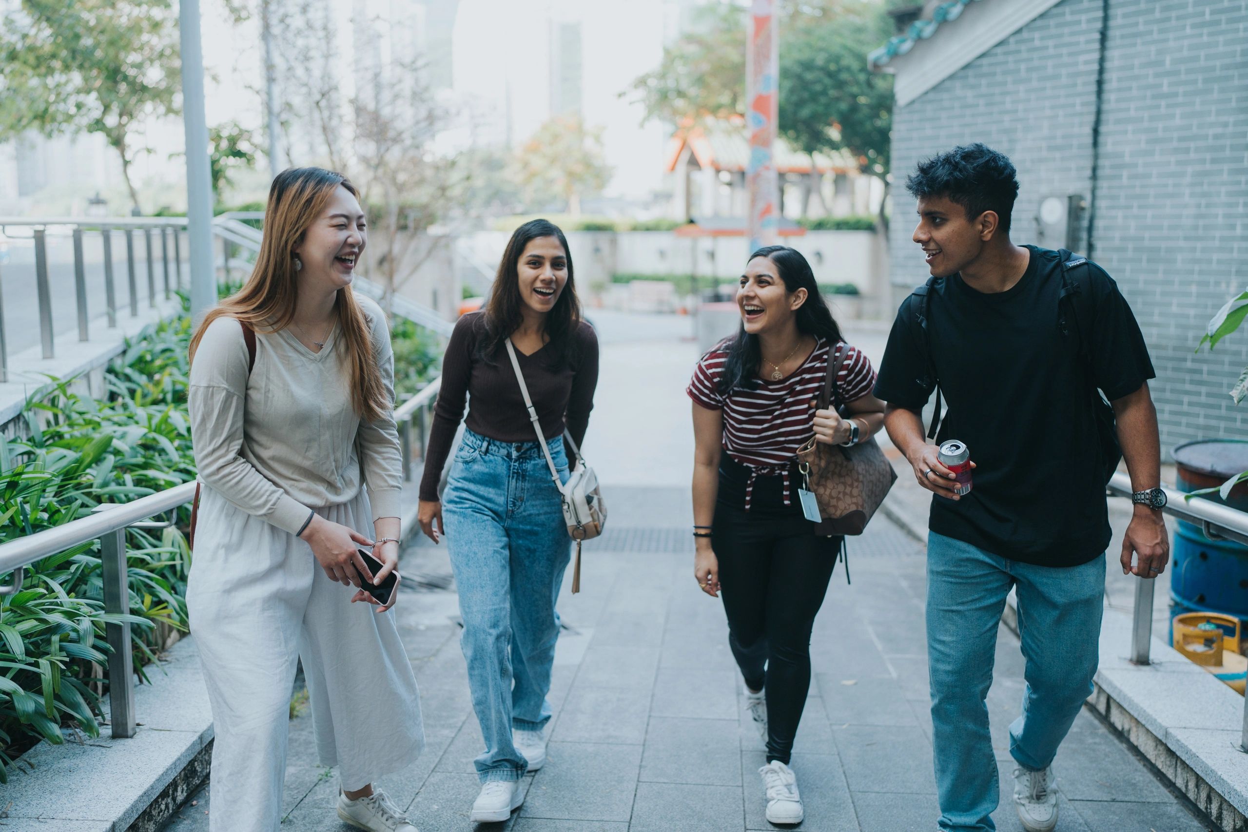 Students socialising outdoors on campus