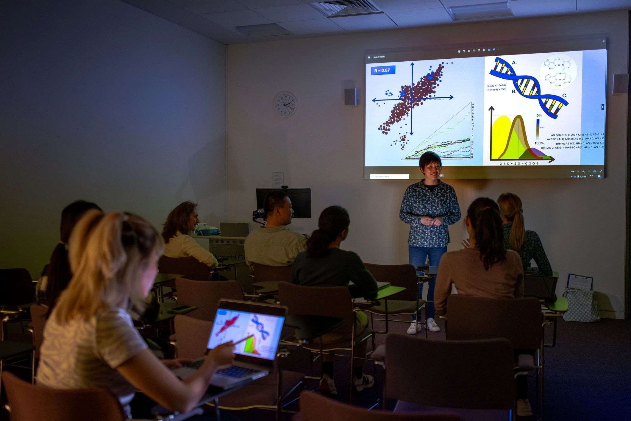 Students attending a guest lecture in an auditorium