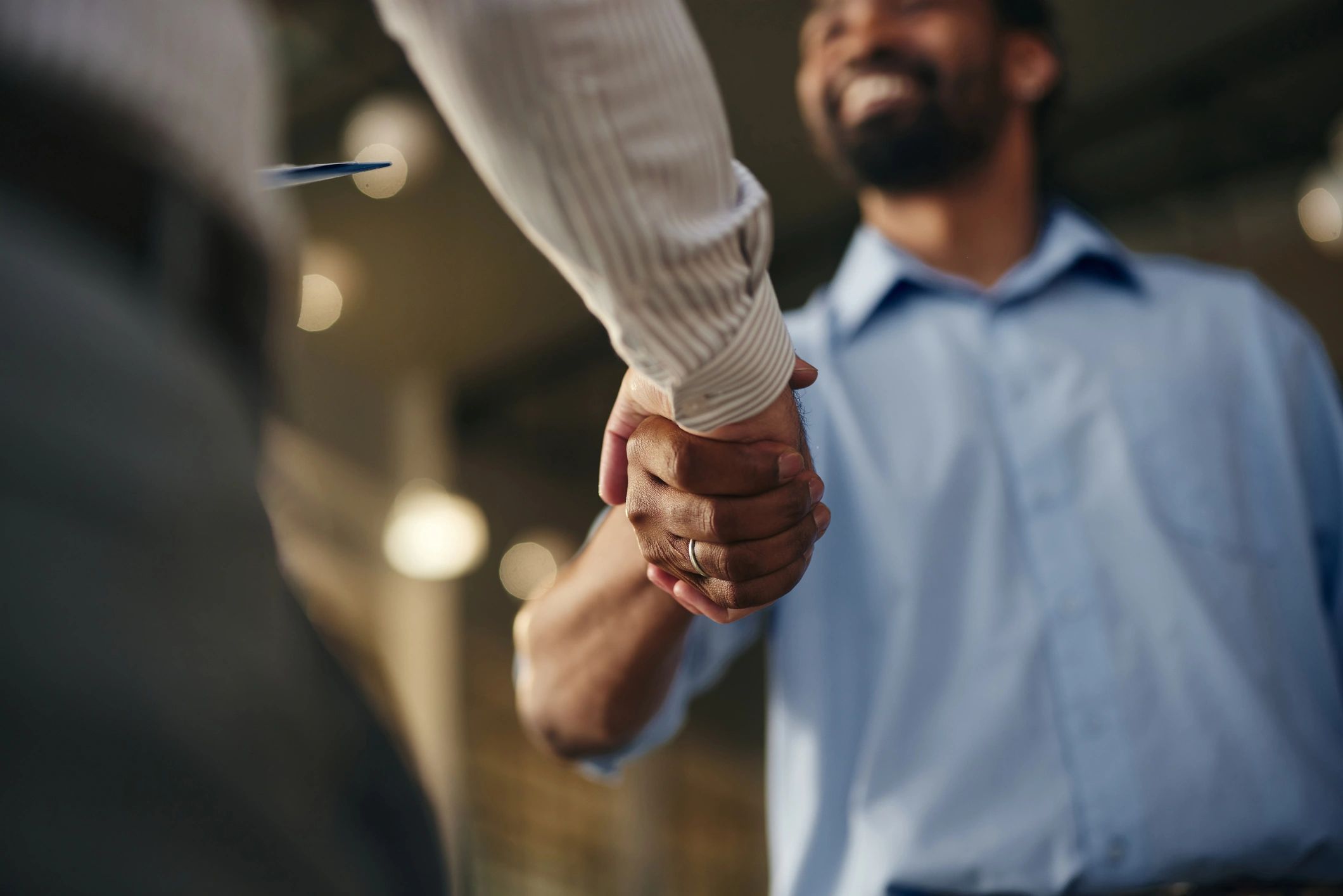 Close-up handshake symbolising agreement