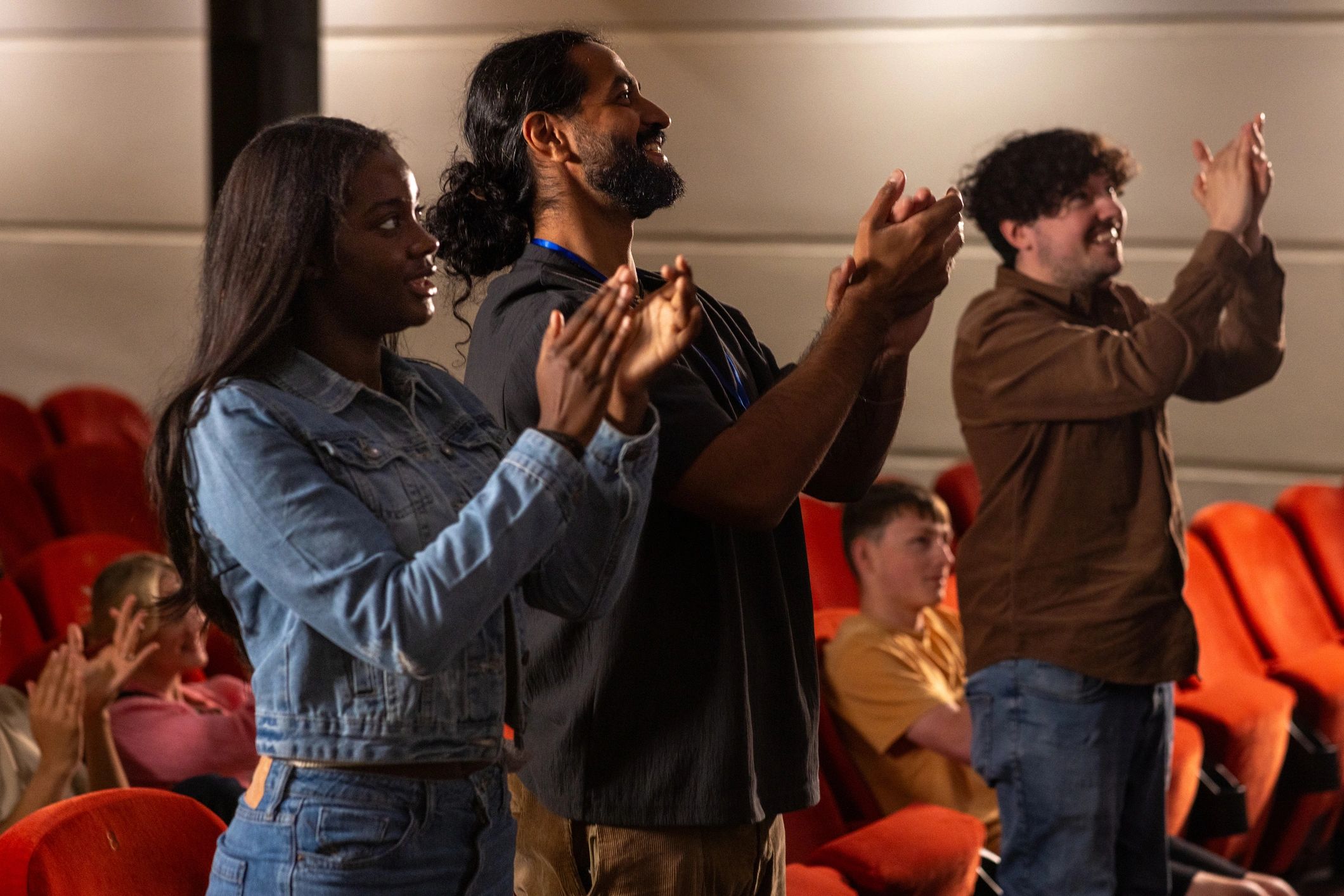 Audience applauding at an event