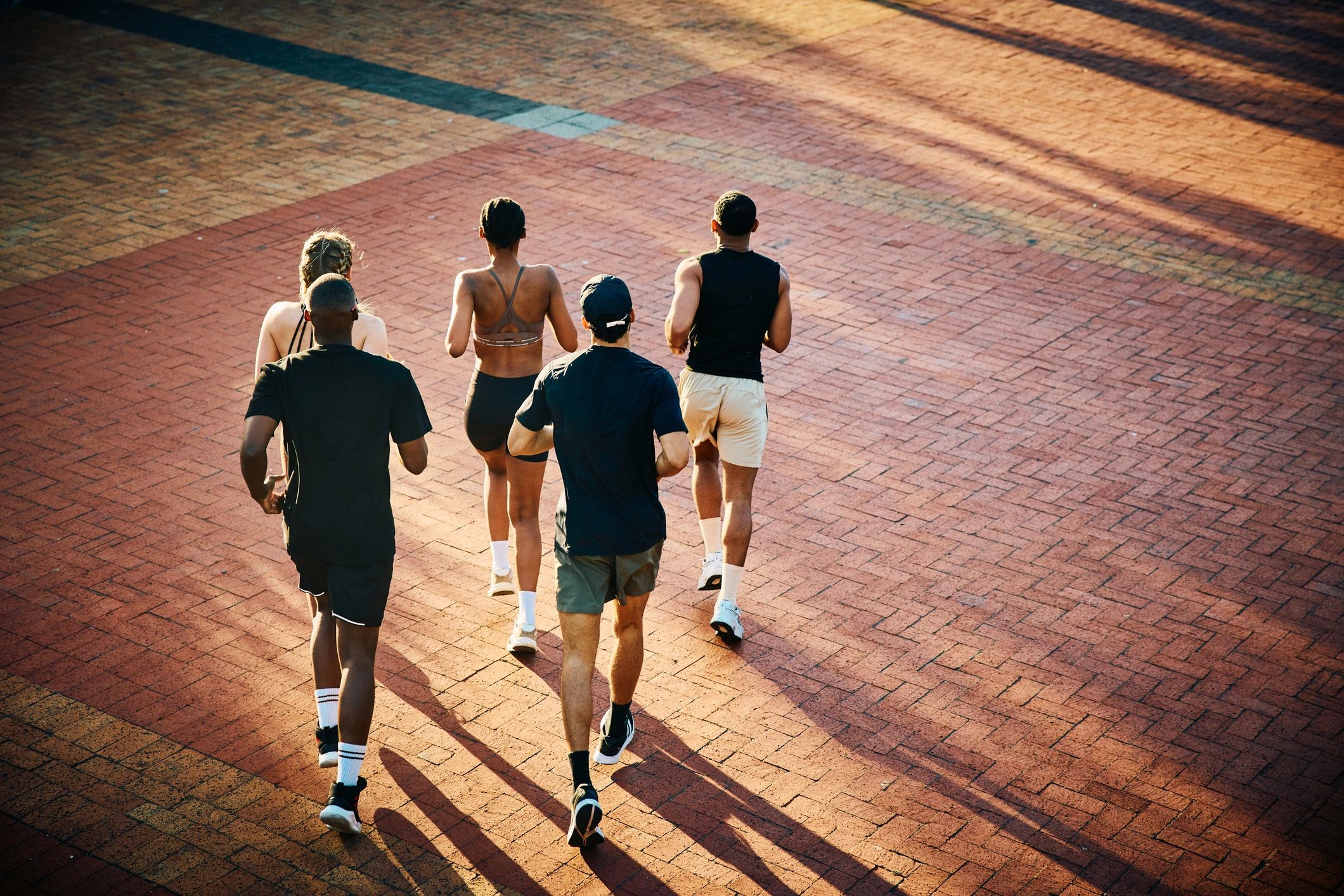 Running club jogging together during endurance training