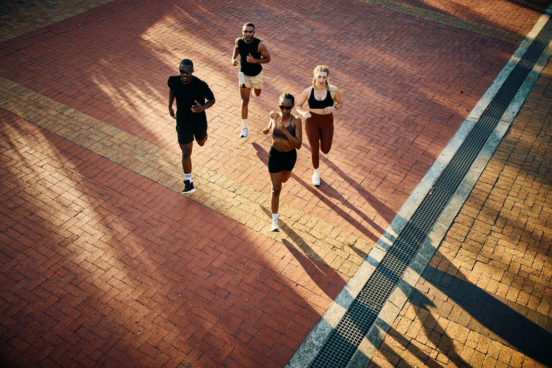 Group of runners training together outdoors
