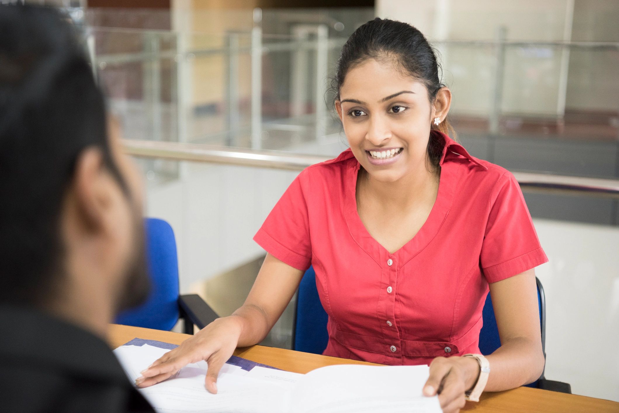 Admissions counselling at an office desk